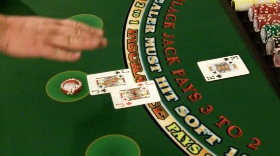 Player is using hand signals for staying Player is using hand signals for staying